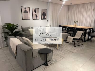 Apartment for sale in Al Khamael Compound, Sheikh Zayed, ground floor with a garden, 160 meters, hotel finish and furnishing