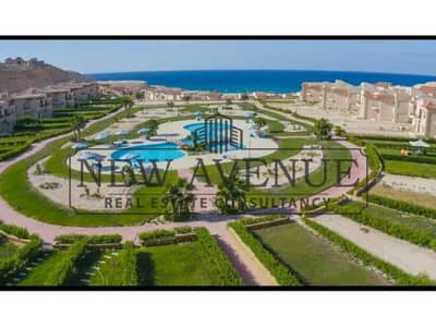 شاليه ارضي بحديقه متشطب كامل للبيع في كورال هيلز Coral Hills Ras Elhikma موقع متميز فيو على حمام السباحه و البحر جاهزة على الاستلام الفوري