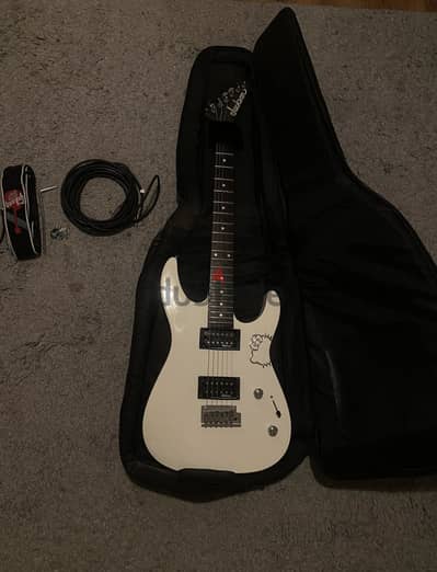 STICKER IS REMOVABLE — Jackson Electric Guitar (with bag)
