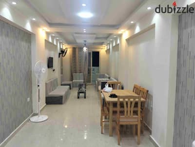 130 m furnished apartment for rent, secondary rent, family or groom or company, 3 bedrooms, two-piece reception, kitchen, bathroom, 6 beds, first upper floor, all facilities available: water, electricity, and natural gas in Alexandria, Al-Ajmi, kilo 21, October entrance, before the gate, in a very distinguished location.