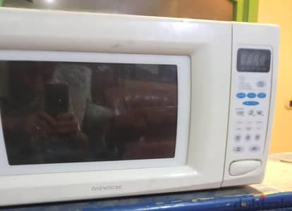 ميكرويف دايو 50 لتر بالشوايه كوري  جديد