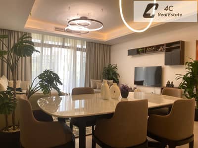 For less than the market price - Cairo Festival - Apartment with a private garden, high-end finishing, distinctive layout, open view landscape,