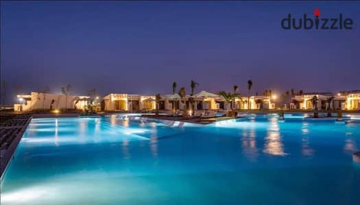 شالية للبيع بسعر مميز و متشطب بالكامل فى قريه دى باي من شركة تطوير مصر يقع بجوار لافيستا بالساحل الشمالي بتسهيلات فى السداد
