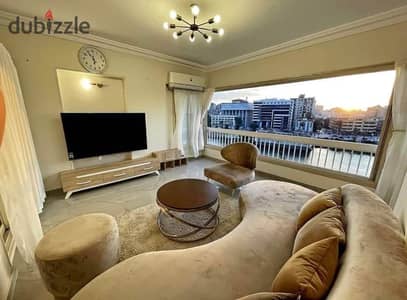Immediate delivery of last fully finished unit furnished with furniture, and AC lowest price in the market and the highest investment view of the Nile