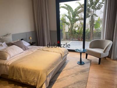 An apartment fully finished with a direct view of the lagoon from Hassan Allam on the Palm Hills hill and near Al Jazeera Club