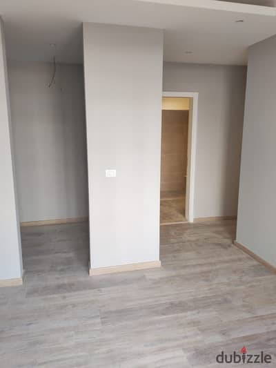 Finished 1 bedrooms apartment +ACs in Village West Sheikh Zayed with installment