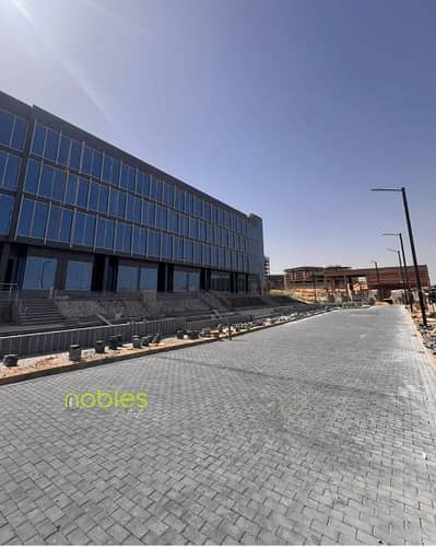 Shop for sale, outdoor space, ground floor, immediate delivery 5% down payment  in the New Capital - Dejoya strip mall 1 - R7