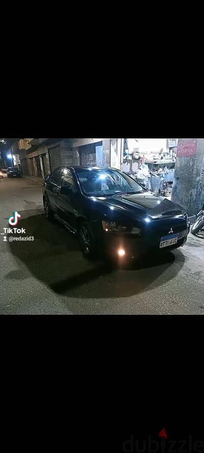 سياره لانسر شارك للايجار اليومى
