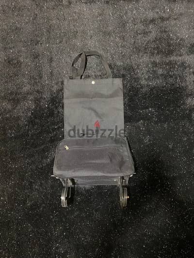 شنطة تسوق وارد امريكا جديدة بالغلاف قابلة للتطبيق  مذودة بجيوب و سوست