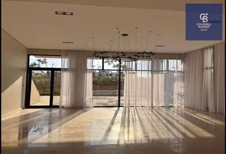 Installment plan available over 9 years for a townhouse villa with a distinctive sea view in O West by Orascom, next to Media Production City.