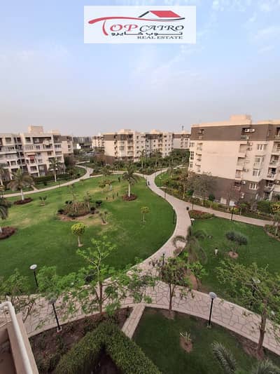 Apartment for sale in Madinaty B10 | Prime location next to services with a wide garden view and in front of The Spine