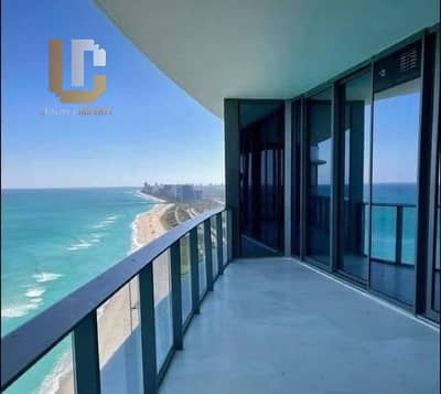Chalet for sale Ready to move, overlooking the sea and lagoon, on the 20th floor of The Gate - Alamein Towers, fully finished.