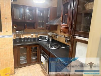 Furnished apartment for rent in Al Rehab City, Phase 5, next to Abu Bakr Al Siddiq Mosque. Ground floor, 90 sq m with a private garden of 83 sq m. Som