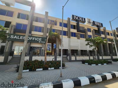 Immediate Collection Store with 20% Down Payment and 8-Year Installment Inside a Mall on the Main Road in October Gardens.