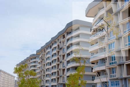 Instant receipt with only the advance payment and installment over 10 years without payments in Midtown Condo compound in the capital at R7 on the central axis and next to the Russian university housing and guaranteed investment