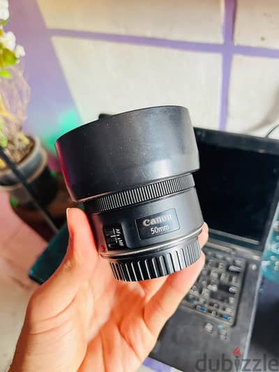 عدسه كانون 50mm stm مع الكرتونه