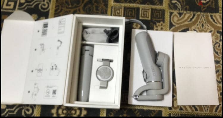 DJI OSMO 5 Smartphone Gimbal  Zero 1