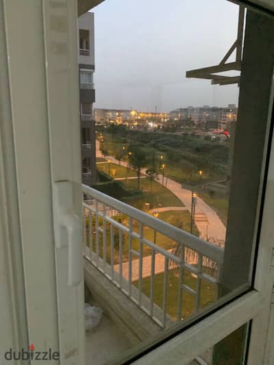 Apartment for rent (old rent law) in Madinaty – B12, Group 122 Garden view, directly facing Craft Zone and East Hub Mall.