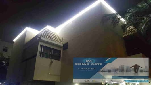 Twin villa for sale in Al Rehab with swimming pool