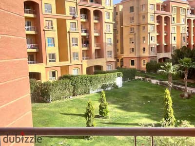 For sale, a distinctive apartment directly on the entertainment area with the largest landscape in the Degla El-Maz compound.