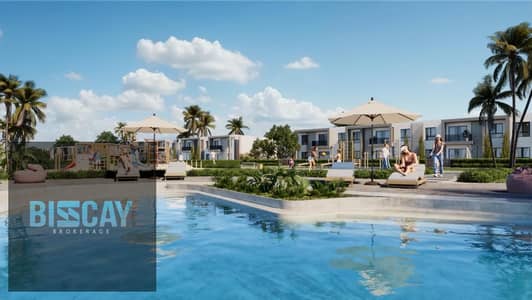 Two-bedroom chalet in Dos North Coast, fully finished, with a 40% discount and flexible payment options over 10 years.