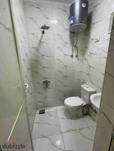 Apartment with 3 rooms, a hall, a bathroom, and a kitchen in October, first neighborhood next to Chef Al-Sham | In front of West Gate Mall and Jomla Market