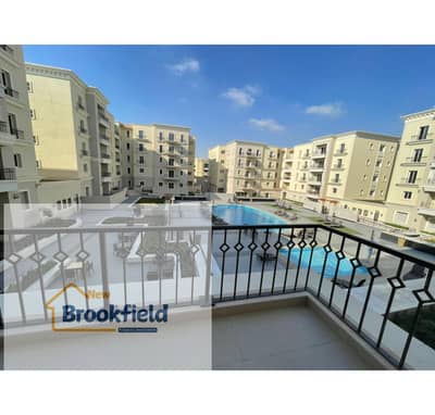 Furnished Apartment for Rent in Mivida Boulevard with a Swimming Pool View.