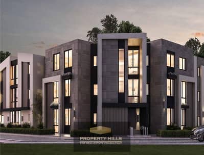 Villa with 3 floors to be received soon in the New Giza plateau next to Swan Lake and Palm Hills