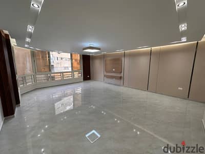 In a new building with new finishing, a very distinctive location in Mohandessin, 180m, luxurious entrance, a very stylish building, 2 elevators, first use, first residence.
