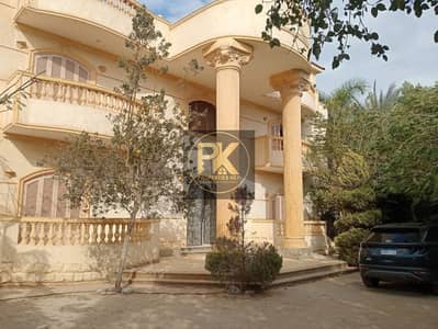 For sale in the heart of Mansouria, in the upscale villa district Al Mansouria, Kerdasa, Giza – Upscale villa district, directly on a paved road, surr