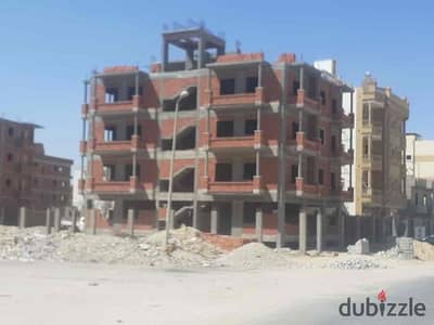 فرصة ذهبية للبيع عمارة سكنية كاملة في أرقي مناطق العاشر من رمضان  كل المنطقة اللى امام البيت اسمها مركز المال و الأعمال  و بدا انشاء مولات فيها