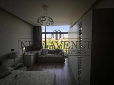 Fully Furniture Apartment for sale Delivered in Water Way 1 New Cairo Overlooking landscape prime location