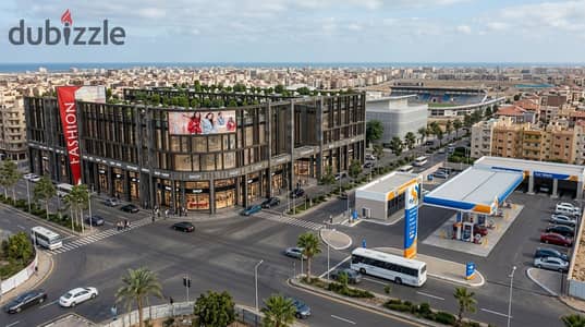 Shop for sale in New Damietta, Center of Services, Third Neighborhood, directly in front of the stadium on the main stadium street, with an area of 38m, with only 5% down payment and installments up to 6 and a half years.