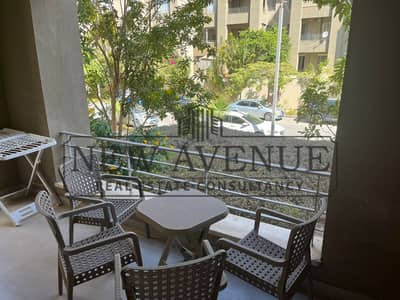 Luxurious finishing and furnished Ground apartment in Palm Hills Village Gate New Cairo very prime location direct on landscape