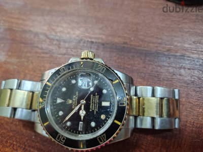 ساعه اتوماتيك أعلى درجات الكوبي وفي شك أنها اصليه مطلية بالذهب