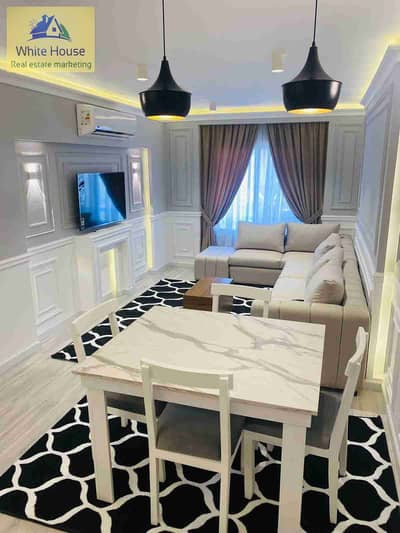 Furnished 108m² apartment for rent in Al Rehab, Phase 1, garden view, first occupancy, high-end finishes