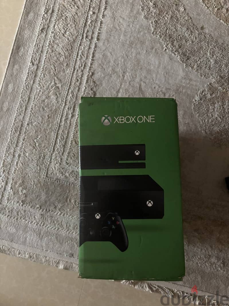 xbox with cartoon and one controller 7