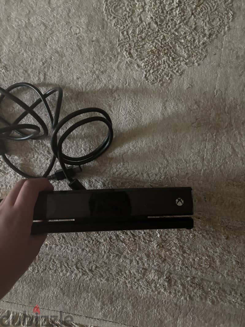 xbox with cartoon and one controller 8