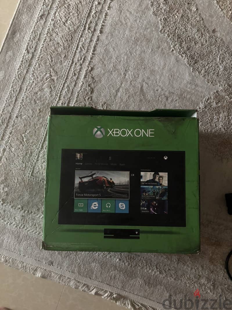 xbox with cartoon and one controller 10