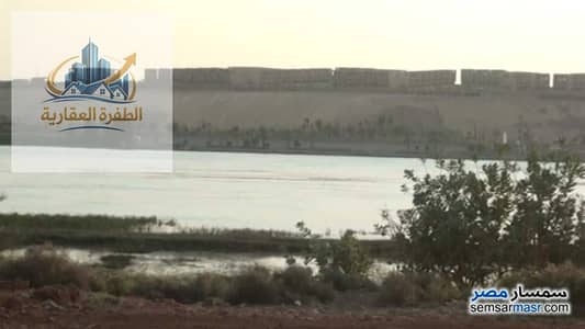 قطعة ارض سكنيه على النيل مباشرة بنجع المحطه بجوارفندق فندق باسم امكانية بناء فندق  اوقصر