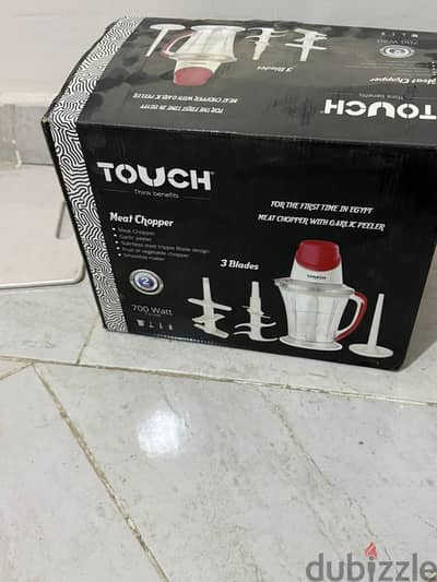وداعاً لريحة الثوم في إيدك. . كبة TOUCH بتقشر وتفرم في ثواني!" (ده أقوى