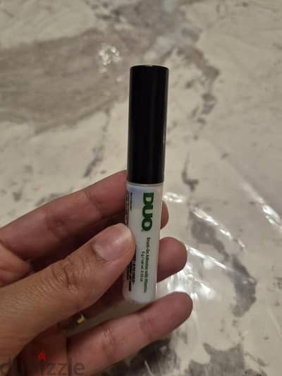 brush on strip lash adhesive. Brand: Duo