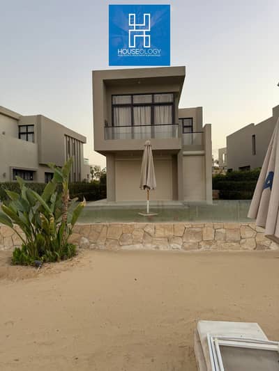 Resale villa with lagoon view for sale in Azha Ain Sokhna at a price lower than the company's price.