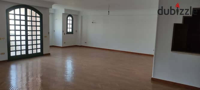 Apartment for sale, old finishing, Third District, Rana Mall Street, overlooking the central axis, 6th of October, Giza