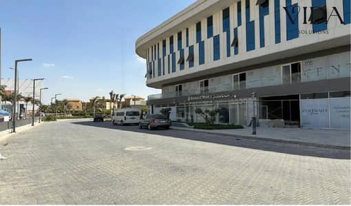 محل للبيع 115م مميز دور ارضي علي محور مباشرة بميدان جهينة مول سنترادا فيو مباشر على المحور استلام فوري مع خصم على سعر المتر