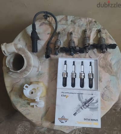 4 رشاشات و حساس كرنك و 4 بوجيهات وفلتر بنزين