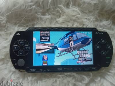 · psp 1000+ لعبة80 +شاحن + الكرت8جيجا +بطارية