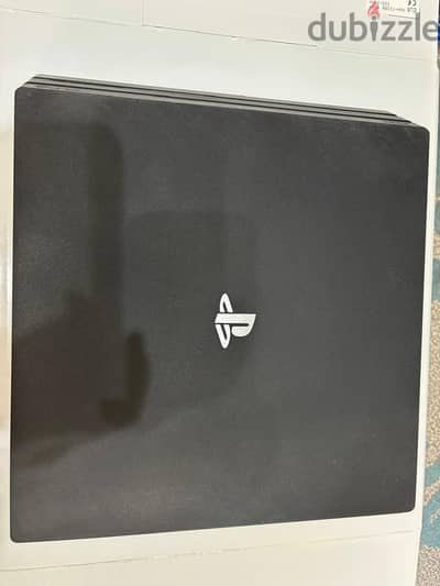Playstation 4 Pro 1TB + Logitech driving wheel for sale