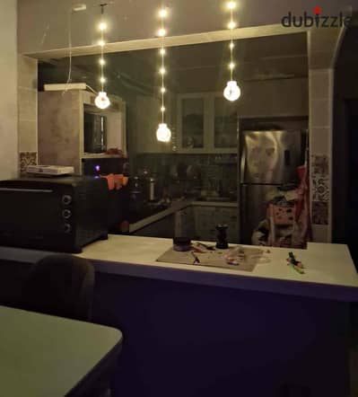 Apartment for sale in Elco City Compound, 80 sqm, on the Italian District Road, with ultra super lux finishing, at a bargain price for a quick sale, in the best location in October Gardens.