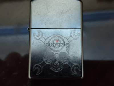 Original Zippo lighter with engraved skull